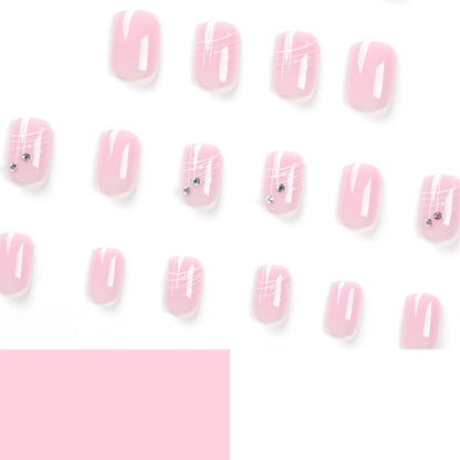 Kunstvolle Nagelverlängerungen mit elegantem Design und Strassverzierungen Brehn