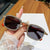 Damen Sonnenbrille mit strassbesetztem Rahmen und modernem Holzdesign Brehn