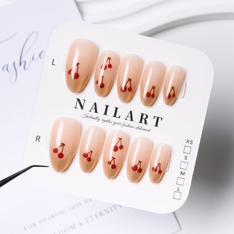 Dekorativer Press-On Nagelset mit verspielten Bogen Designs Brehn