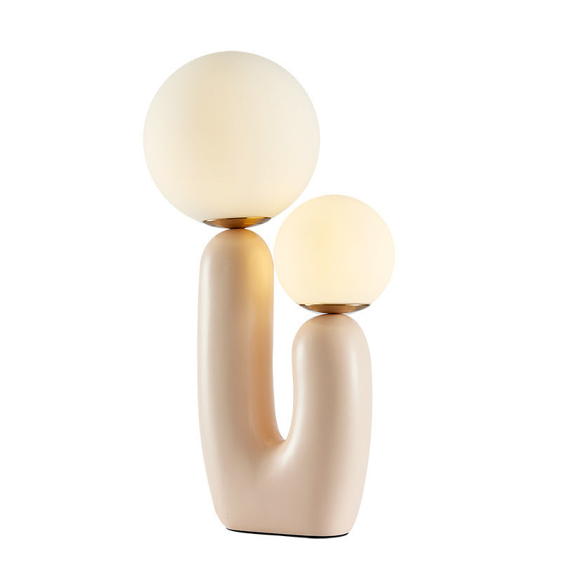 Künstlerische Tischlampe mit dualem Globusdesign