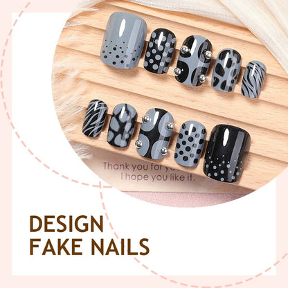 Kunstnagelset mit stilvollen Schwarz- und Grautönen Brehn