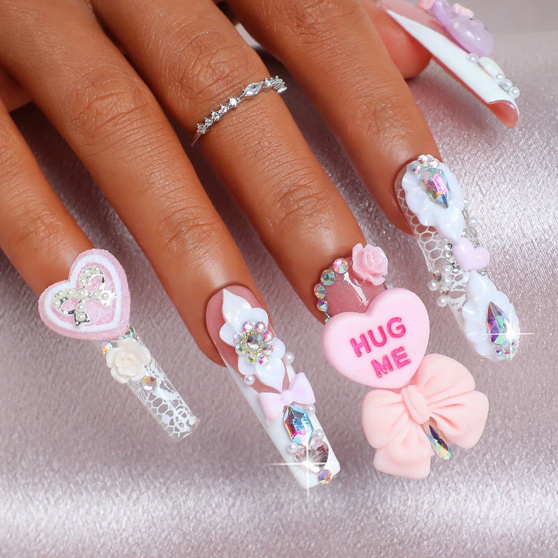 Kreatives Kunstnagelset mit verspielten Tier- und Herzmotiven Brehn
