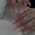 Kunstnagelset mit eleganten Spitzen und verspieltem 3D-Design Brehn