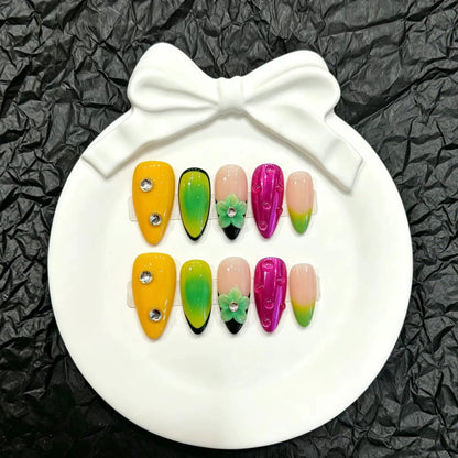 Künstlerisches Press-On-Nagelset mit floralen und Farbübergang-Designs