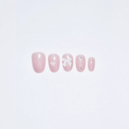 Künstlerisches Press-On Nagelset mit eleganten Schleifenakzenten Brehn