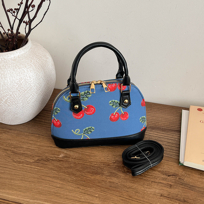 WoBestickte Kirschmuster-Handtasche Brehn