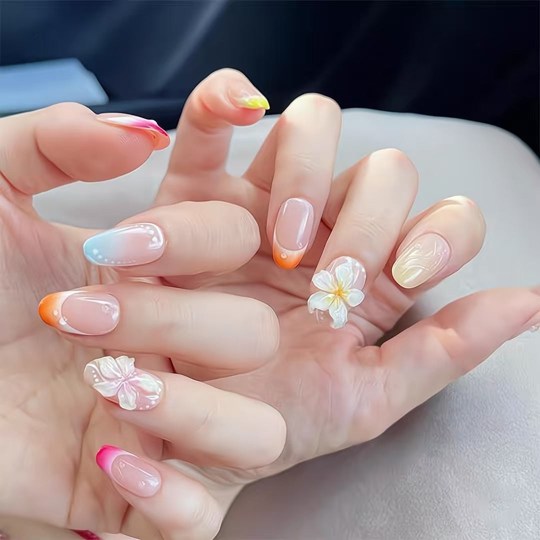 Künstlerisches Press-On-Nagelset mit floralen und Ombré-Designs Brehn