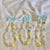 Charmante Perlen-Handy Charm Brehn