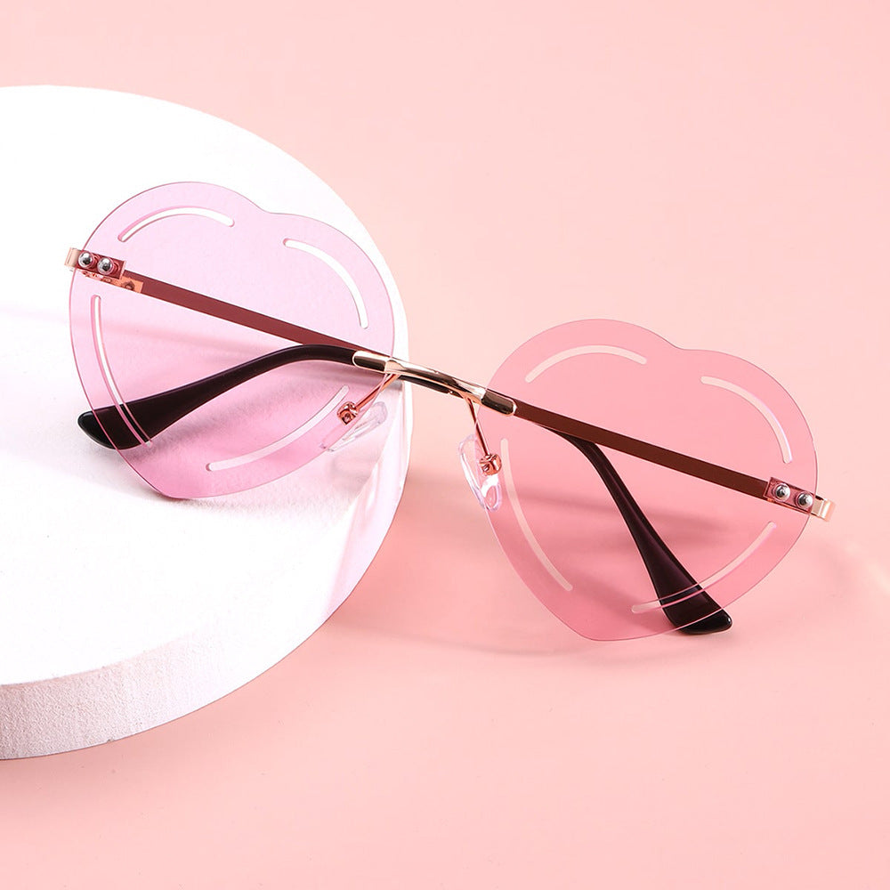 Damen Herzförmige Sonnenbrille mit stylischem Metallrahmen Brehn