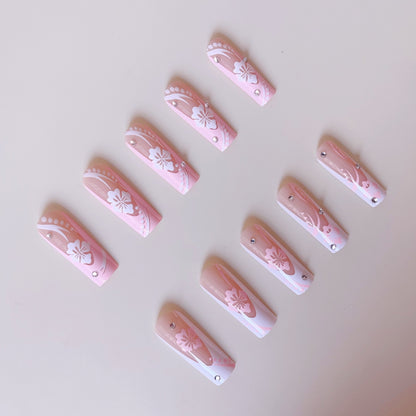 Kunstnagelset mit elegantem Blumen-Design und Kristallverzierungen Brehn