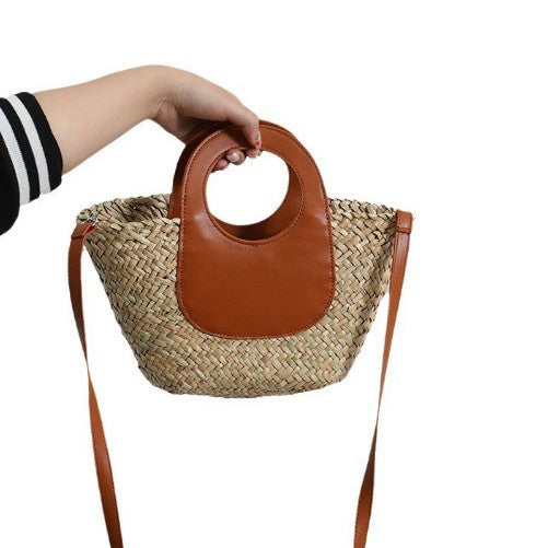 Damen Handtasche aus geflochtenem Material mit Lederdetails Brehn