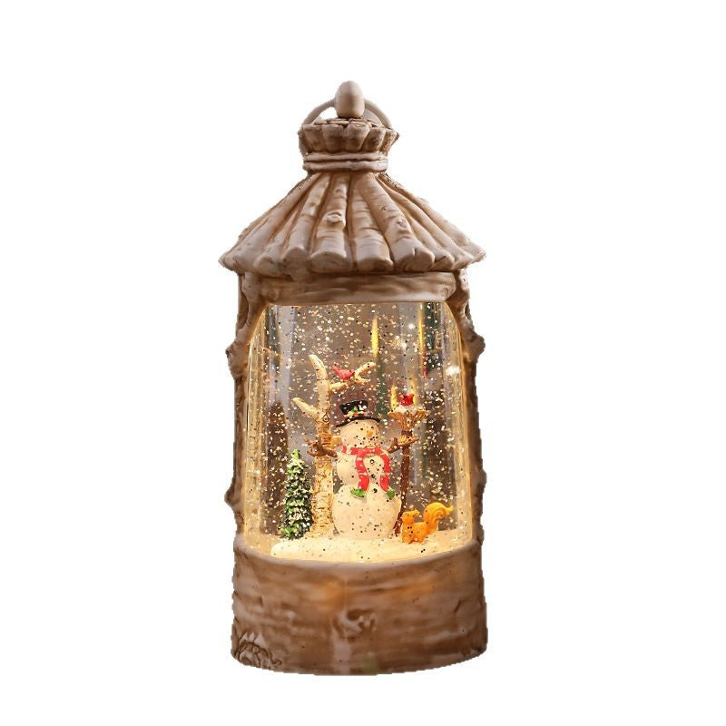 Beleuchtete Weihnachtslaterne mit Schneeszenen Brehn