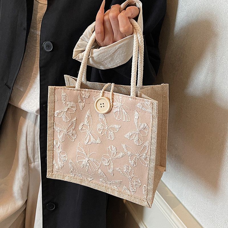Schmetterling bestickte Stofftasche