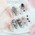 Kreatives Kunstnagelset mit Halloween-Motiven und filigranen Details Brehn