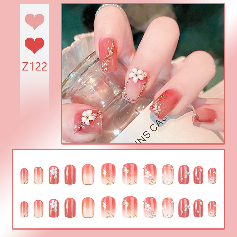 Kunstnagelset mit eleganten Glitzerverzierungen und schimmernden Akzenten Brehn