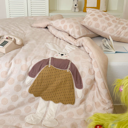 Kinder-Steppbett-Garnitur mit appliziertem Hunde-Motiv und Tupfenmuster