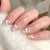 Kunstvolle Nagelkunst mit Herzmuster Brehn