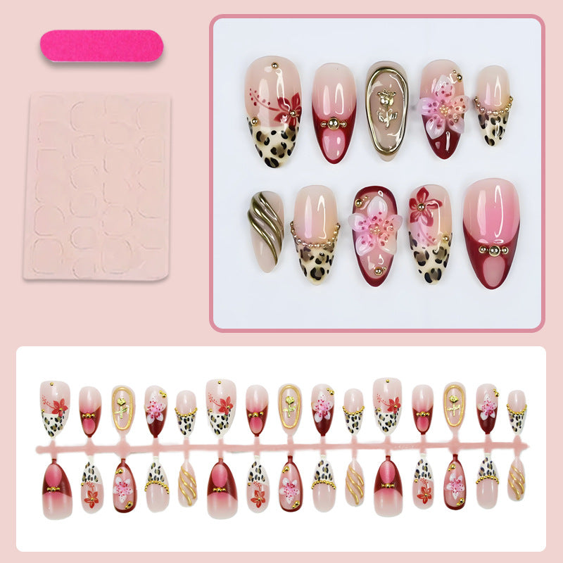 Kunstnagelset mit eleganten floralen und tierischen Akzenten Brehn