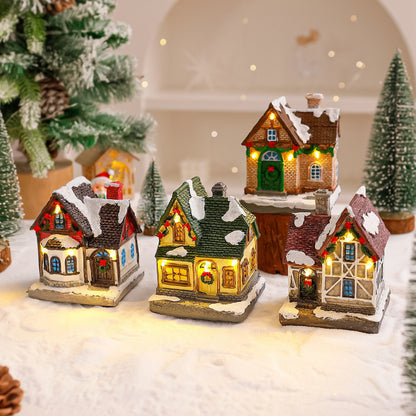 Dekoratives Weihnachtsdorf mit Lichtern Brehn