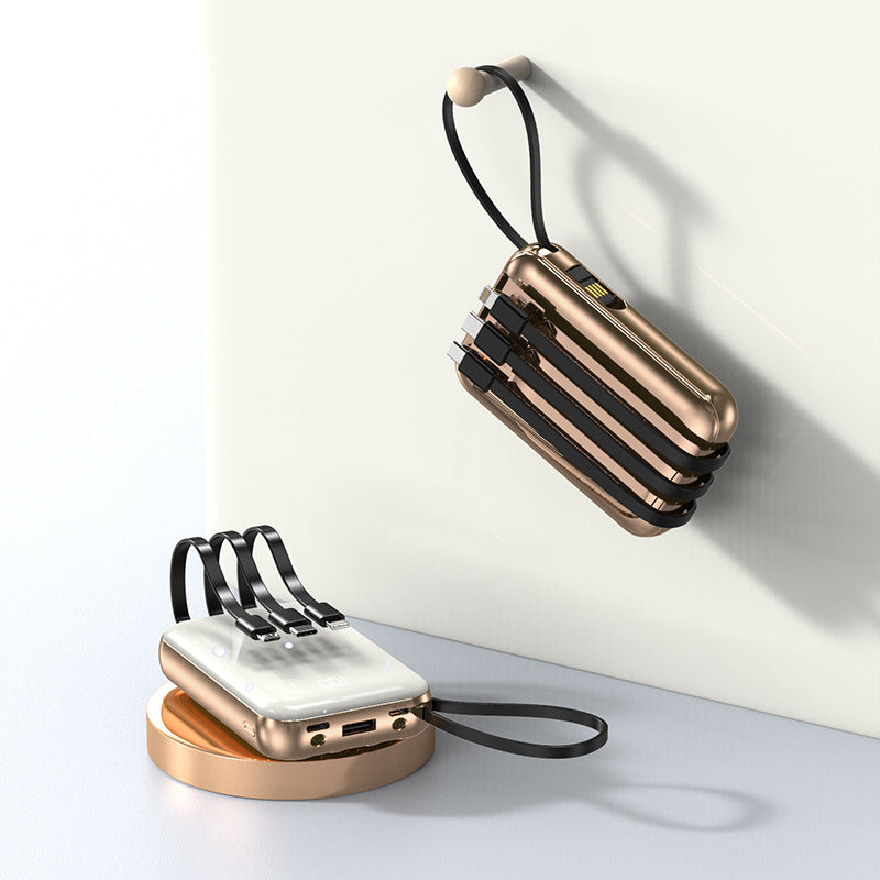 Tragbare Powerbank mit integrierten Ladekabeln und digitaler Ladeanzeige Brehn