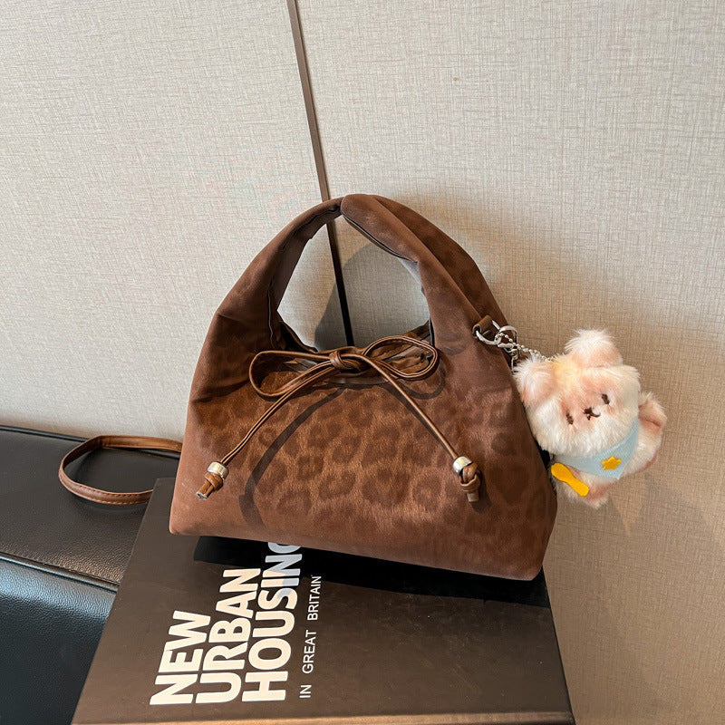 Stylische und funktionale Drawstring-Handtasche Brehn