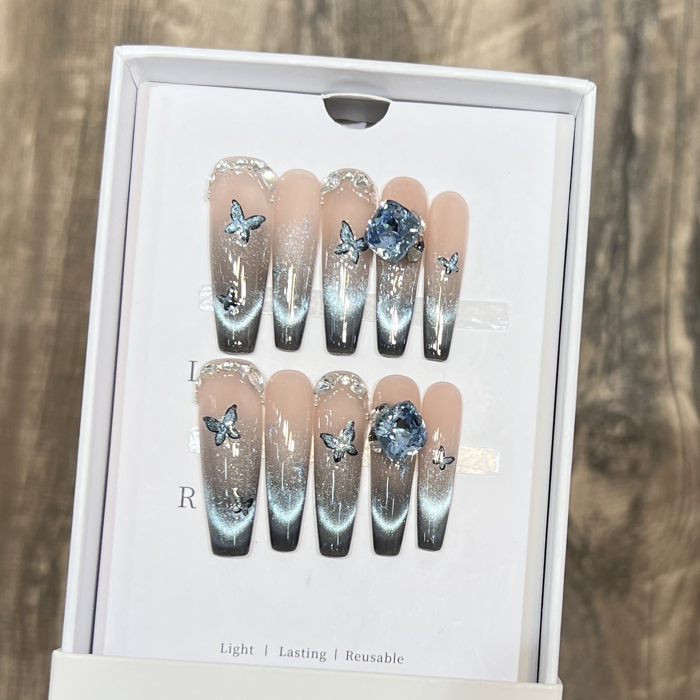Künstlerisches Ombre Press-On Nagelkunstset mit Schmetterlings- und Edelsteinakzenten Brehn
