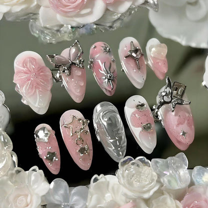 Kunstnagelset mit funkelnden 3D-Verzierungen und kreativen Designs Brehn