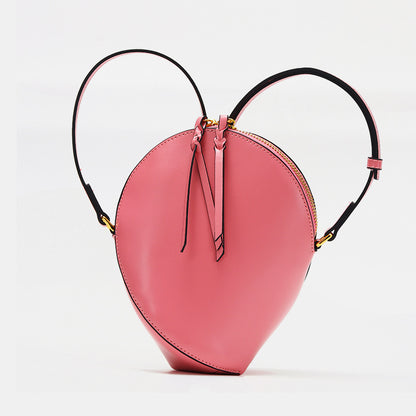 Skulpturales Tropfen-Crossbody-Bag mit verstellbarem Riemen & Quastenreißverschluss