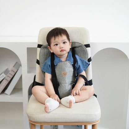 Transportable gepolsterter Babystuhl-Hochstuhl mit Sicherheitsgurten