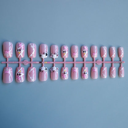 Dekoratives Nagelkunst-Set mit Schleife und Spinnennetzdesign