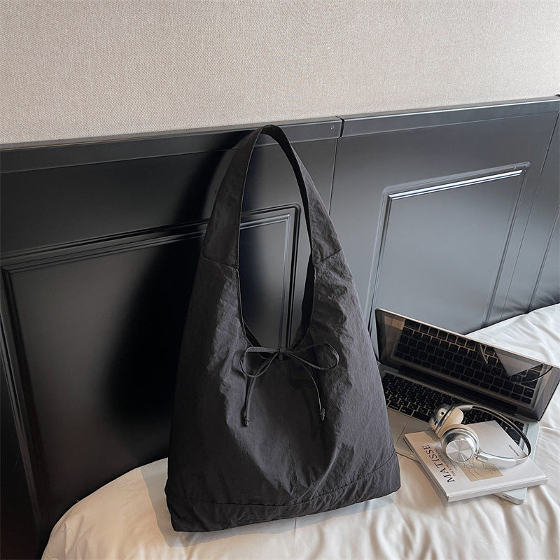 Lässiger verstellbarer Sling Tote