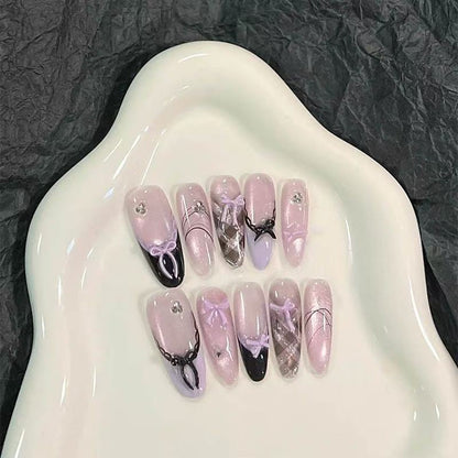 Künstlerisches Press-On-Nagelset mit Schleifenmuster