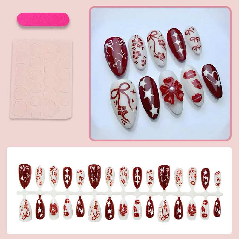 Kunstnagelset mit romantischen Herz- und Blütenmotiven Brehn