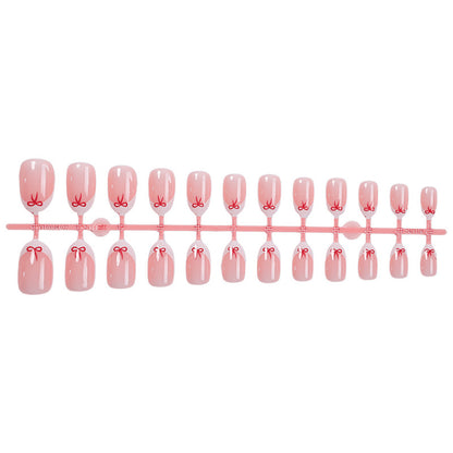 Elegante Kunstnagel-Set mit zarten Schleifenakzenten Brehn