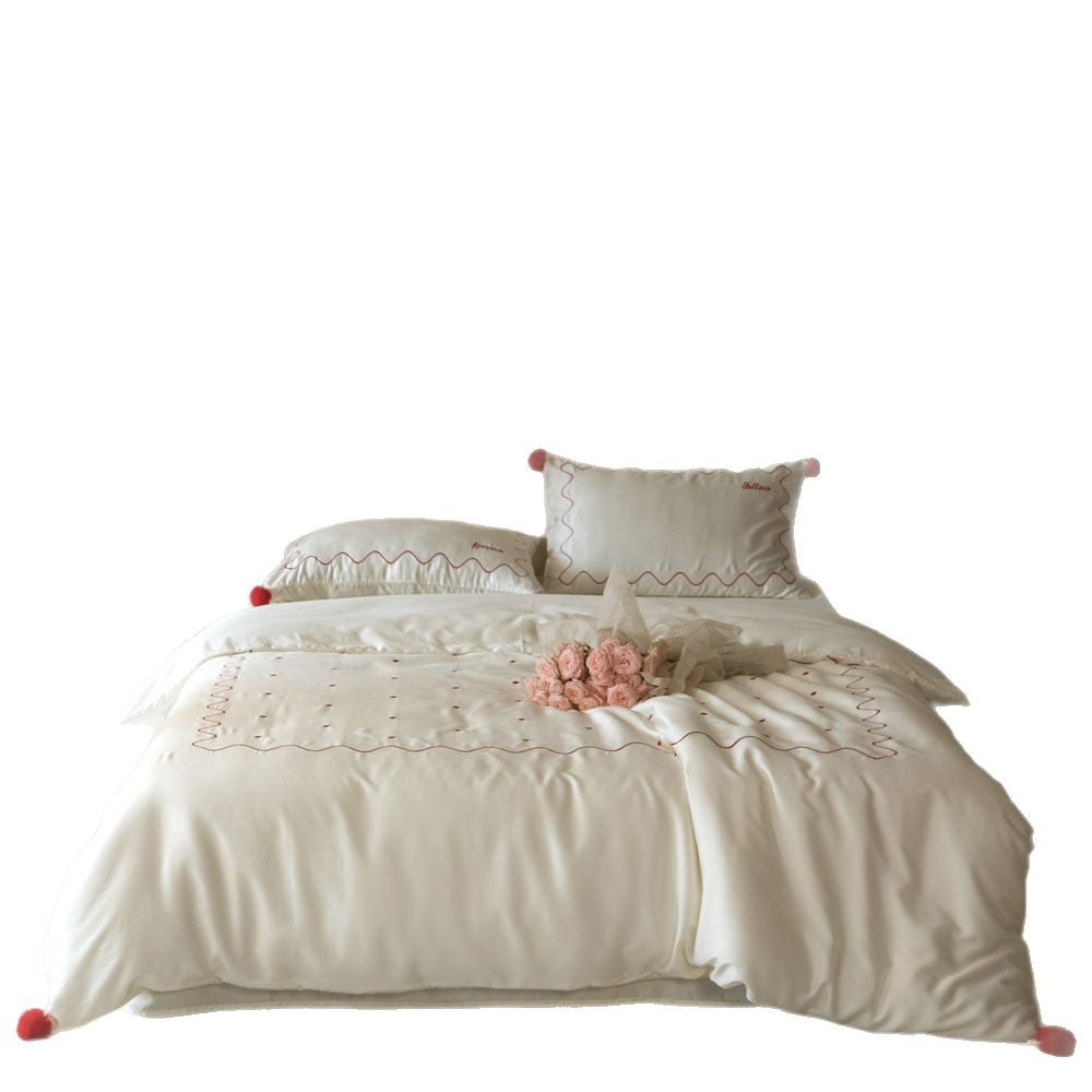Bettwäsche-Set aus Baumwollsatin mit gewellter Stickkante und Pompon-Kissen