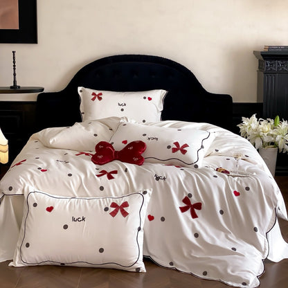 Dekorative Baumwollsatin Bettbezug Set mit gesticktem Schleifen- und Punktemuster