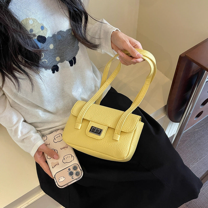 Kompakte klassische Handtasche
