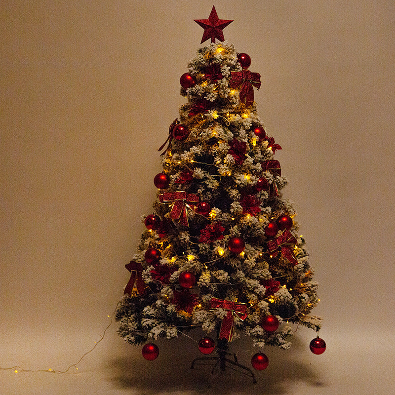 Premium Flocked Weihnachtsbaum mit dekorativen Ornamenten Brehn
