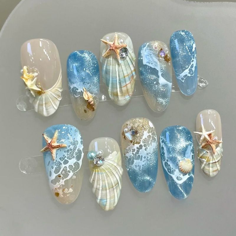 Kunstnagelset mit floralen Mustern und Ombre-Effekten Brehn