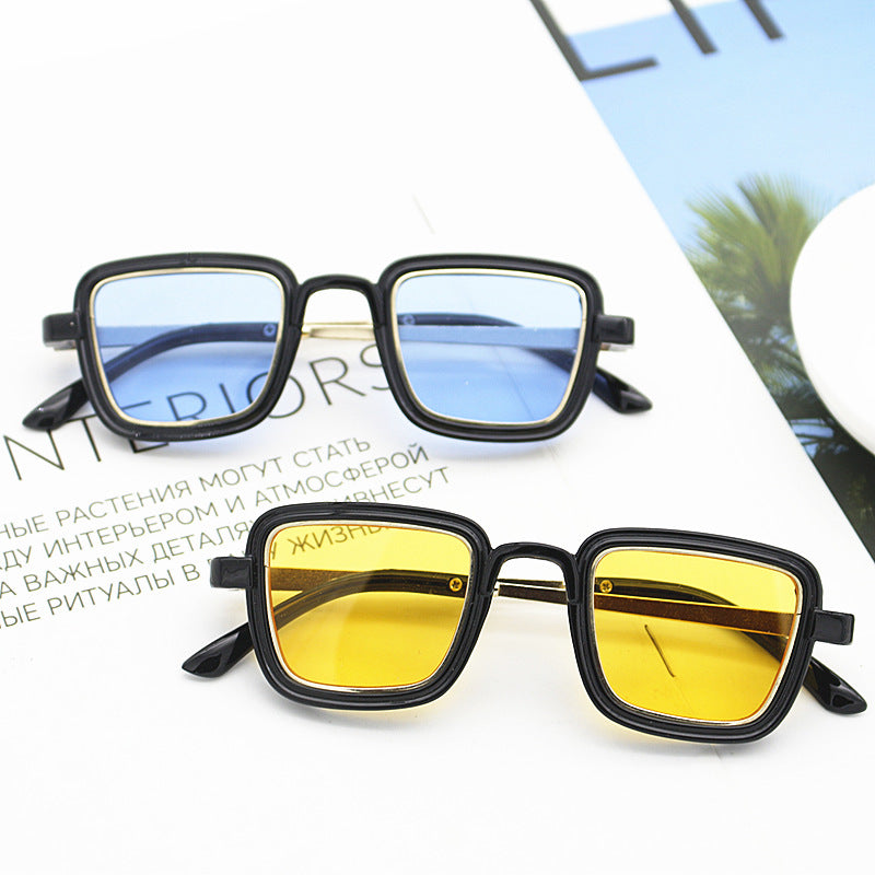 Damen quadratische Sonnenbrille mit transparentem Rahmen und goldenen Akzenten Brehn