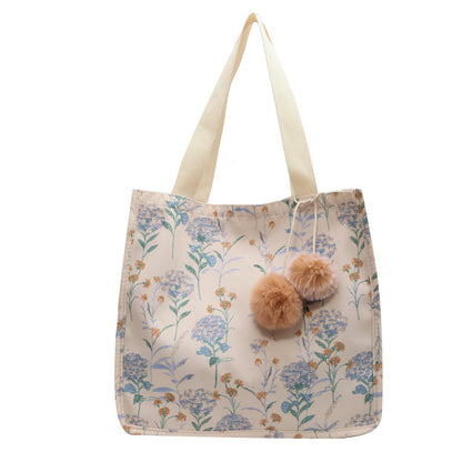 Blumenverzierte Tasche