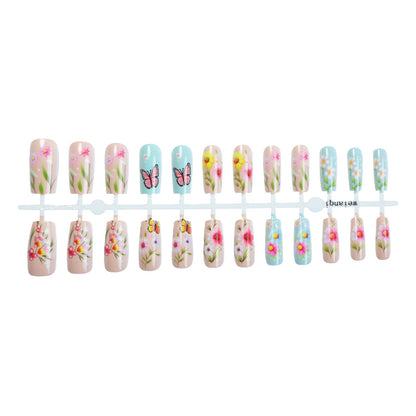 Dekoratives Press-On Nagelkunst Set mit Blumen- und Schmetterlingsdesigns Brehn