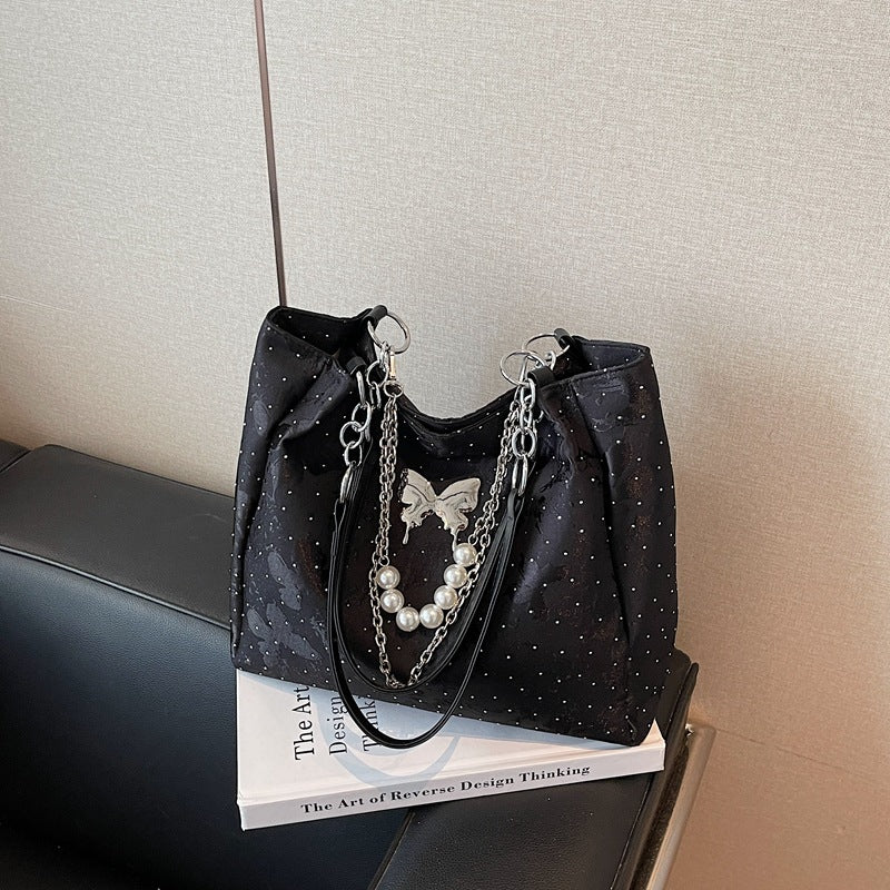 Elegante Handtasche mit Perlendetails Brehn