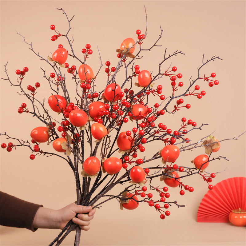 Dekorative Granatapfelblütenarrangement