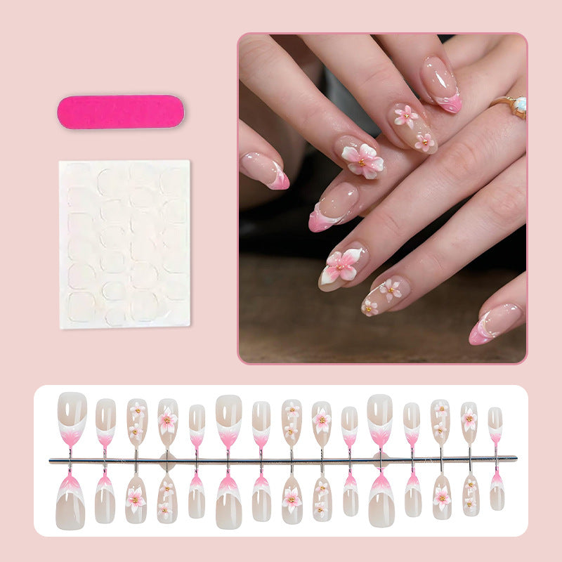 Kunstnagelset mit romantischen Blumen- und Ombre-Effekten Brehn