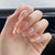 Kunstnagelset mit elegantem French-Tipp und Glitzerakzenten Brehn