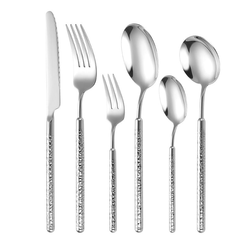 Eleganter Dessertlöffel mit Kunstvollem Griffdesign Brehn