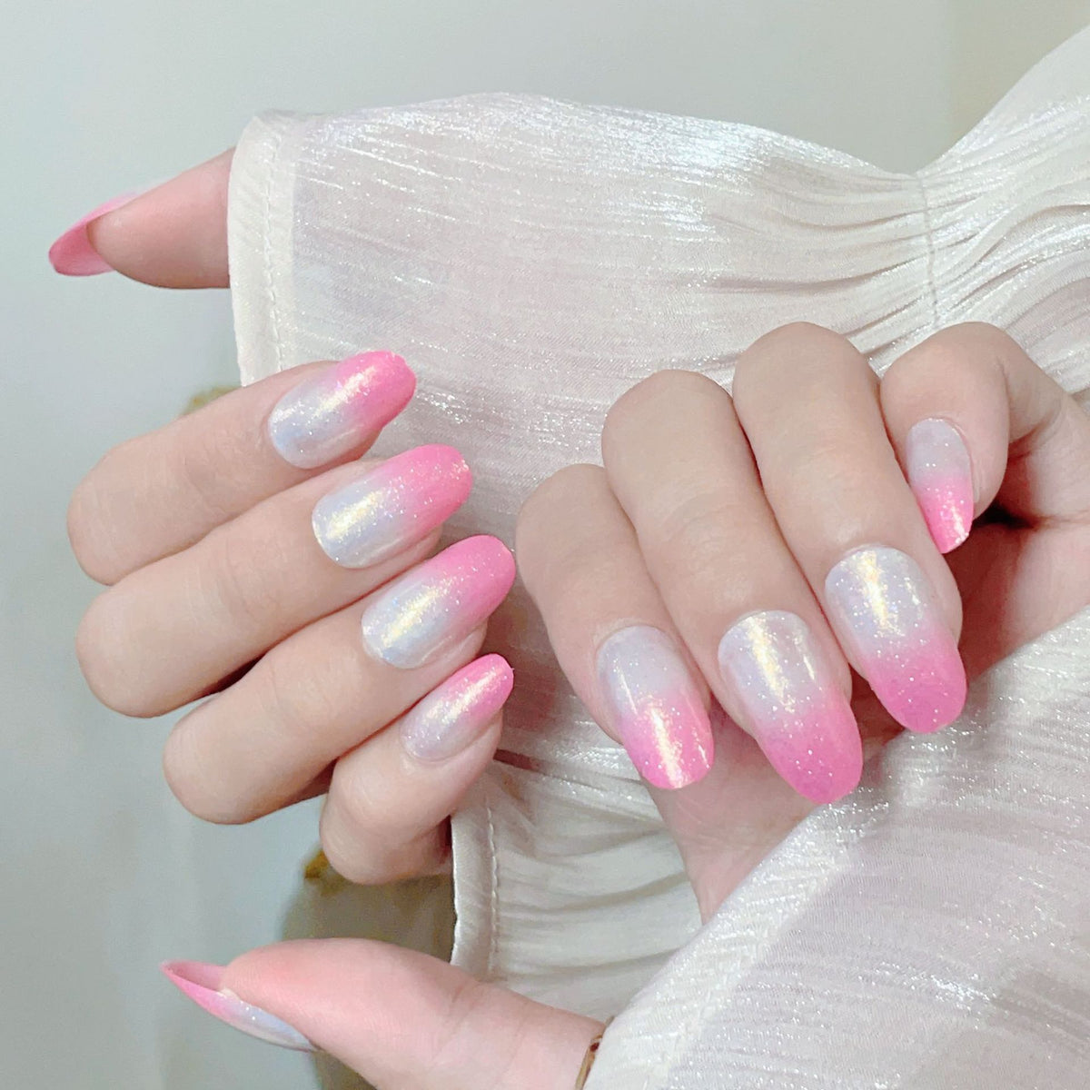 Kunstnägel mit Glitzer-Gradient und Ombre-Effekt Brehn