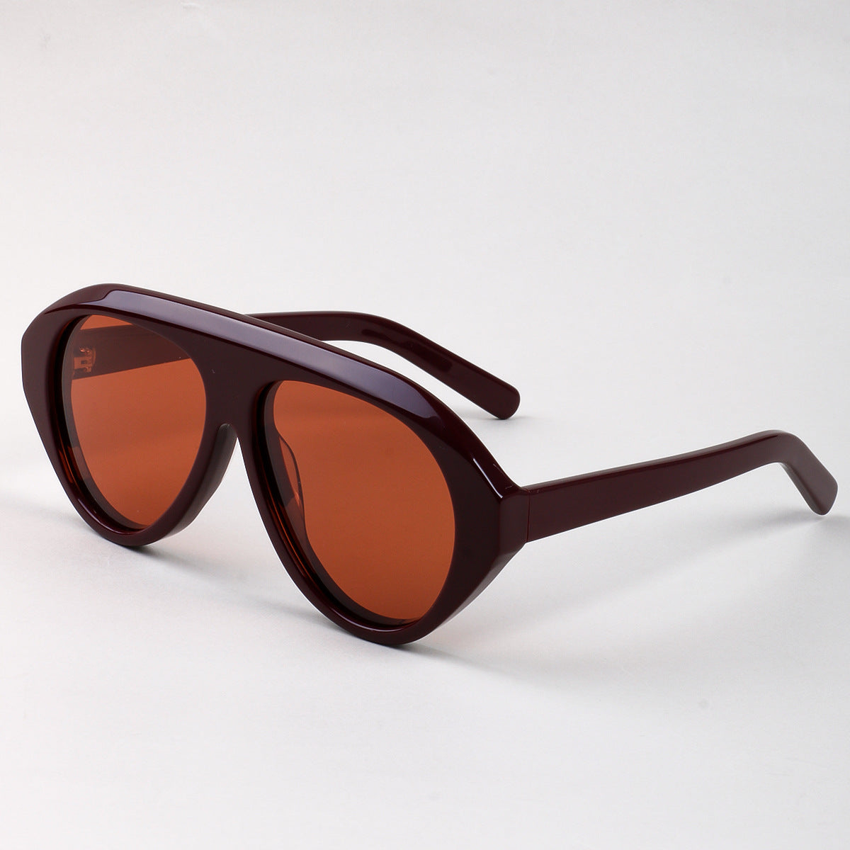 Damen Statement Sonnenbrille mit breitem Rahmen und grünen Gläsern Brehn