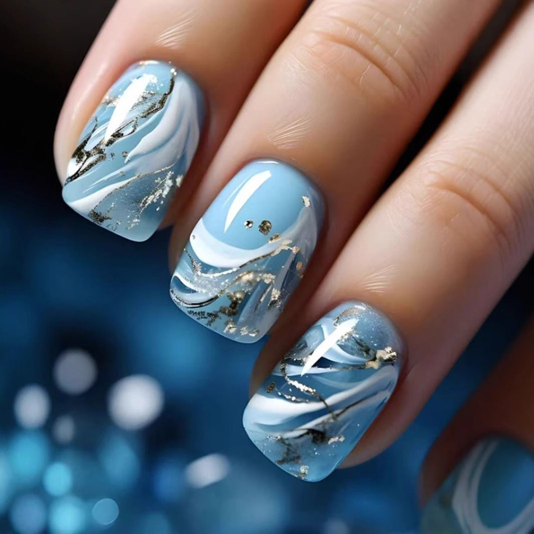 Kunstnagelset mit luxuriösem Marmor-Design und Goldakzenten Brehn